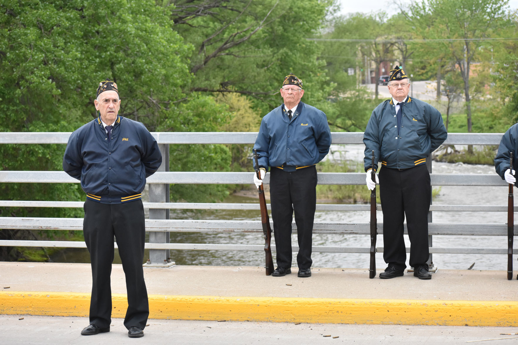 Veterans stand at attention